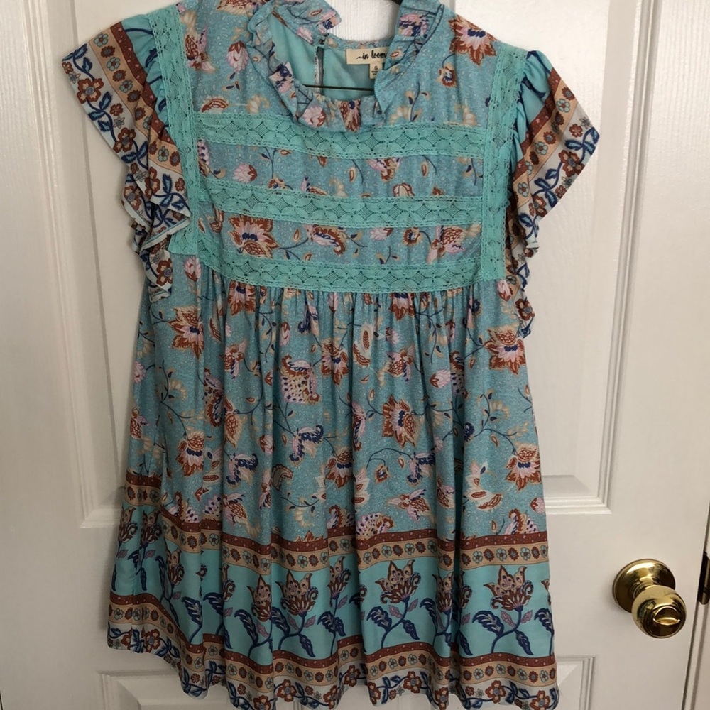 Colorful baby doll shirt in blue and rust